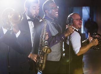 Reggie sings scat with his jazz band and has a large following of fans for his live performances. Reggie sings scat with his jazz band and has a large following of fans for his live performances.