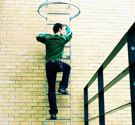 The second-story man climbs up the fire escape ladder to break into apartments through the windows. The second-story man climbs up the fire escape ladder to break into apartments through the windows.