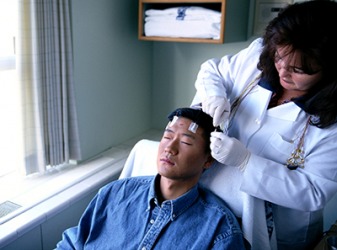 A patient receiving epilepsy monitoring to evaluate his seizures (seizer). A patient receiving epilepsy monitoring to evaluate his seizures (seizer).