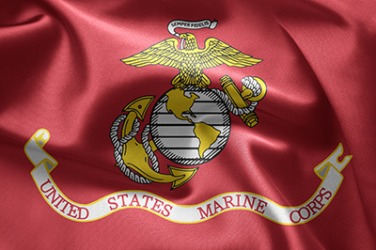 The eagle holds a ribbon with the motto Semper Fidelis on the United States Marine Corps emblem. The eagle holds a ribbon with the motto Semper Fidelis on the United States Marine Corps emblem.
