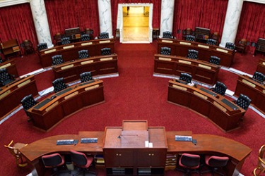 The Idaho senators meet in the senate chamber of the Idaho State Capitol Building in Boise. The Idaho senators meet in the senate chamber of the Idaho State Capitol Building in Boise.