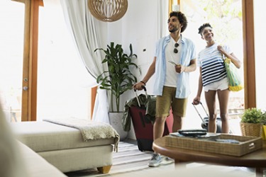 Calvin and Sylvia are taking advantage of a sharing economy by renting a home from a private owner for their vacation in Miami. Calvin and Sylvia are taking advantage of a sharing economy by renting a home from a private owner for their vacation in Miami.