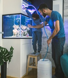 The tube allows for siphonage of the fish tank water into the container. The tube allows for siphonage of the fish tank water into the container.