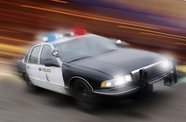 The policeman activated the siren on his patrol vehicle as he sped down the highway. The policeman activated the siren on his patrol vehicle as he sped down the highway.