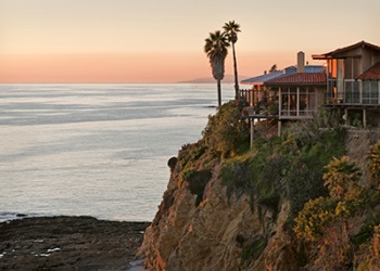 The house in Laguna Beach, California is situated on the edge of the cliff. The house in Laguna Beach, California is situated on the edge of the cliff.