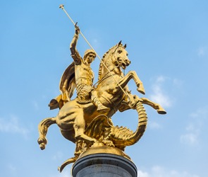 A statue of St. George slaying the dragon in Tbilisi, Georgia. A statue of St. George slaying the dragon in Tbilisi, Georgia.