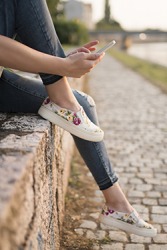 She likes to wear slip-on loafers in the summer because they are lightweight and comfortable. She likes to wear slip-on loafers in the summer because they are lightweight and comfortable.