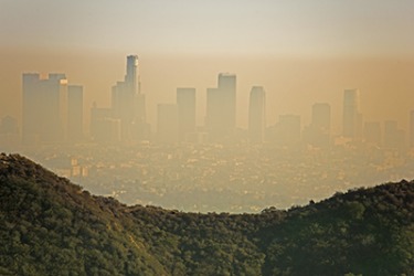The smaze in the air over the city of Los Angeles contains small particles of health damaging pollution that can worsen asthma and other respiratory illnesses. The smaze in the air over the city of Los Angeles contains small particles of health damaging pollution that can worsen asthma and other respiratory illnesses.