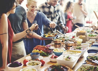 A smorgasbord of delicious dishes was spread out on a long table at the party. A smorgasbord of delicious dishes was spread out on a long table at the party.