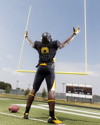 The football player is smug when he scores the touchdown. The football player is smug when he scores the touchdown.