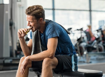 The chemical energy generated from eating the protein bar helps Christopher power through the rest of his workout. The chemical energy generated from eating the protein bar helps Christopher power through the rest of his workout.