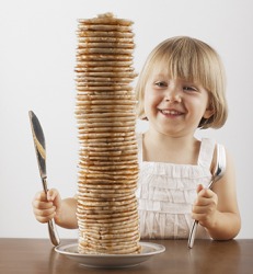 Julia could hardly wait to start eating the gargantuan stack of pancakes. Julia could hardly wait to start eating the gargantuan stack of pancakes.