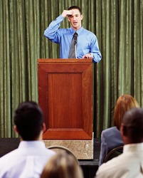 The shy and taciturn young man felt extremely nervous while giving his presentation to the audience. The shy and taciturn young man felt extremely nervous while giving his presentation to the audience.