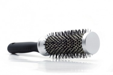 A round hair brush. A round hair brush.