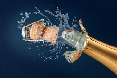 This champagne bottle has just burst open. This champagne bottle has just burst open.