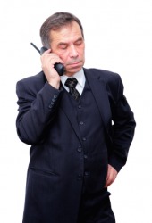 A businessman on the telephone. A businessman on the telephone.