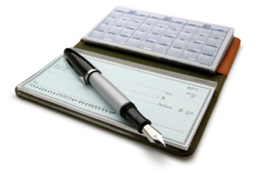 A pad of checks in a checkbook. A pad of checks in a checkbook.