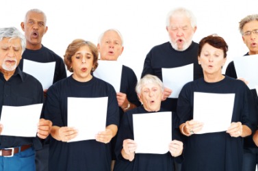 A group of singers at choir practice. A group of singers at choir practice.