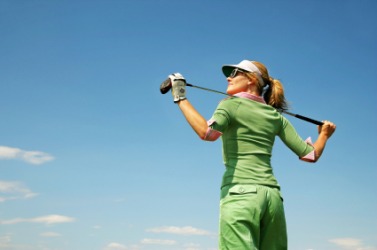 A woman clad all in green. A woman clad all in green.