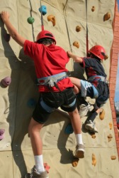 Climbers on an artificial rock wall. Climbers on an artificial rock wall.