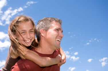 A young girl with her dad. A young girl with her dad.