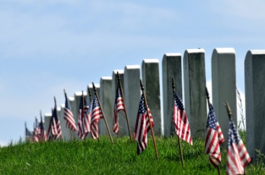 Flags adorn soldiers graves on Memorial Day also called Decoration Day. Flags adorn soldiers graves on Memorial Day also called Decoration Day.