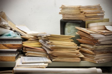 A desk in disorder. A desk in disorder.