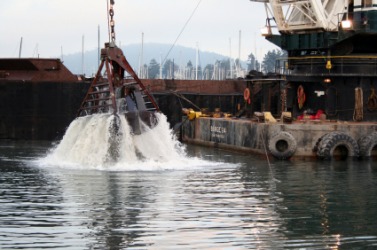 A dredger at work. A dredger at work.