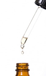 Liquid being dispensed from a dropper. Liquid being dispensed from a dropper.