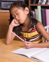A drowsy child. A drowsy child.