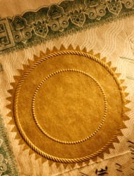 An old certificate embossed with a gold seal. An old certificate embossed with a gold seal.