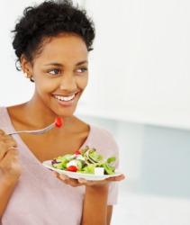 This woman enjoys her meal. This woman enjoys her meal.