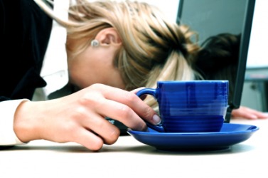 A woman deals with exhaustion. A woman deals with exhaustion.