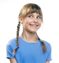 A young girl with an expressive face. A young girl with an expressive face.