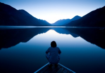 A calm lake at sunset. A calm lake at sunset.
