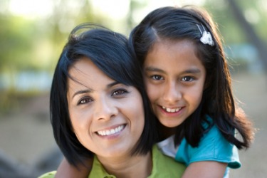 A child shows filial devotion to her mother. A child shows filial devotion to her mother.