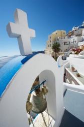 A Greek cross on top of a church. A Greek cross on top of a church.