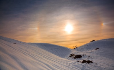 A halo surrounding the sun. A halo surrounding the sun.