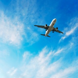 A plane high in the sky. A plane high in the sky.