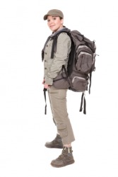 A woman wearing a backpack or knapsack. A woman wearing a backpack or knapsack.