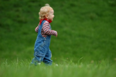 A young bairn, or child, running. A young bairn, or child, running.