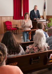An interpreter for the deaf at a church service. An interpreter for the deaf at a church service.
