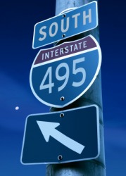 A sign pointing to an interstate highway. A sign pointing to an interstate highway.