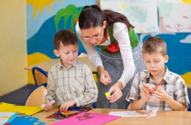 A teacher uses art to encourage students to be creative. A teacher uses art to encourage students to be creative.