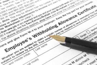 A form for determining payroll deductions. A form for determining payroll deductions.