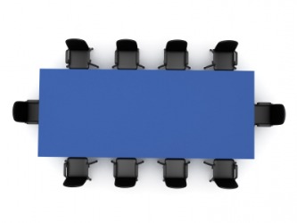 An oblong conference table. An oblong conference table.