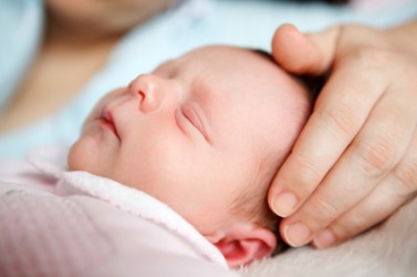 An innocent newborn baby. An innocent newborn baby.