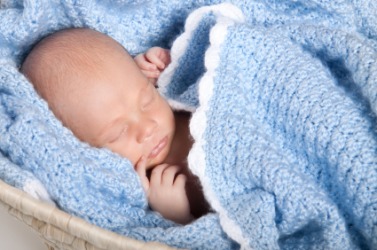 This baby is cosey. This baby is cosey.
