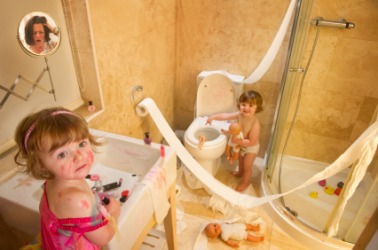 A pair of naughty little children. A pair of naughty little children.
