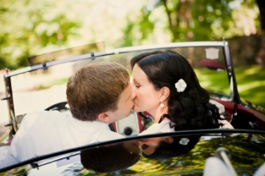 A couple share a kiss. A couple share a kiss.